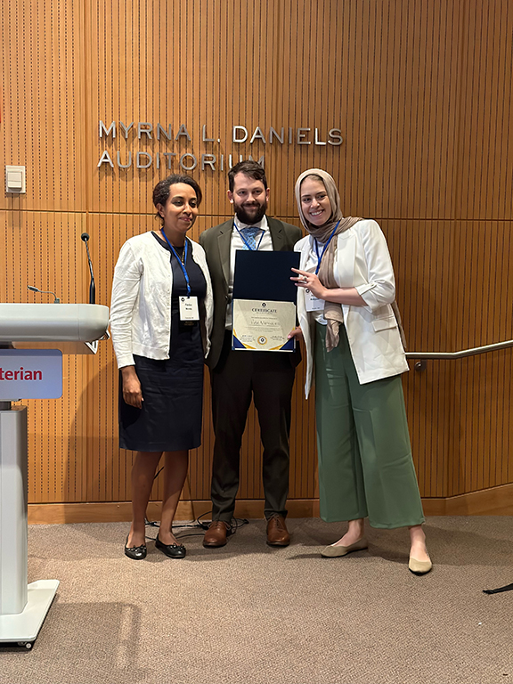 Heba Mahjoub, MD (right) pictured with Dr. Fasika Woreta (left),Wilmer Ophthalmology Residency Program Director and President of ASOT and Dr. Grant Justin (middle), Assistant Professor of Surgery in the Uniformed Services